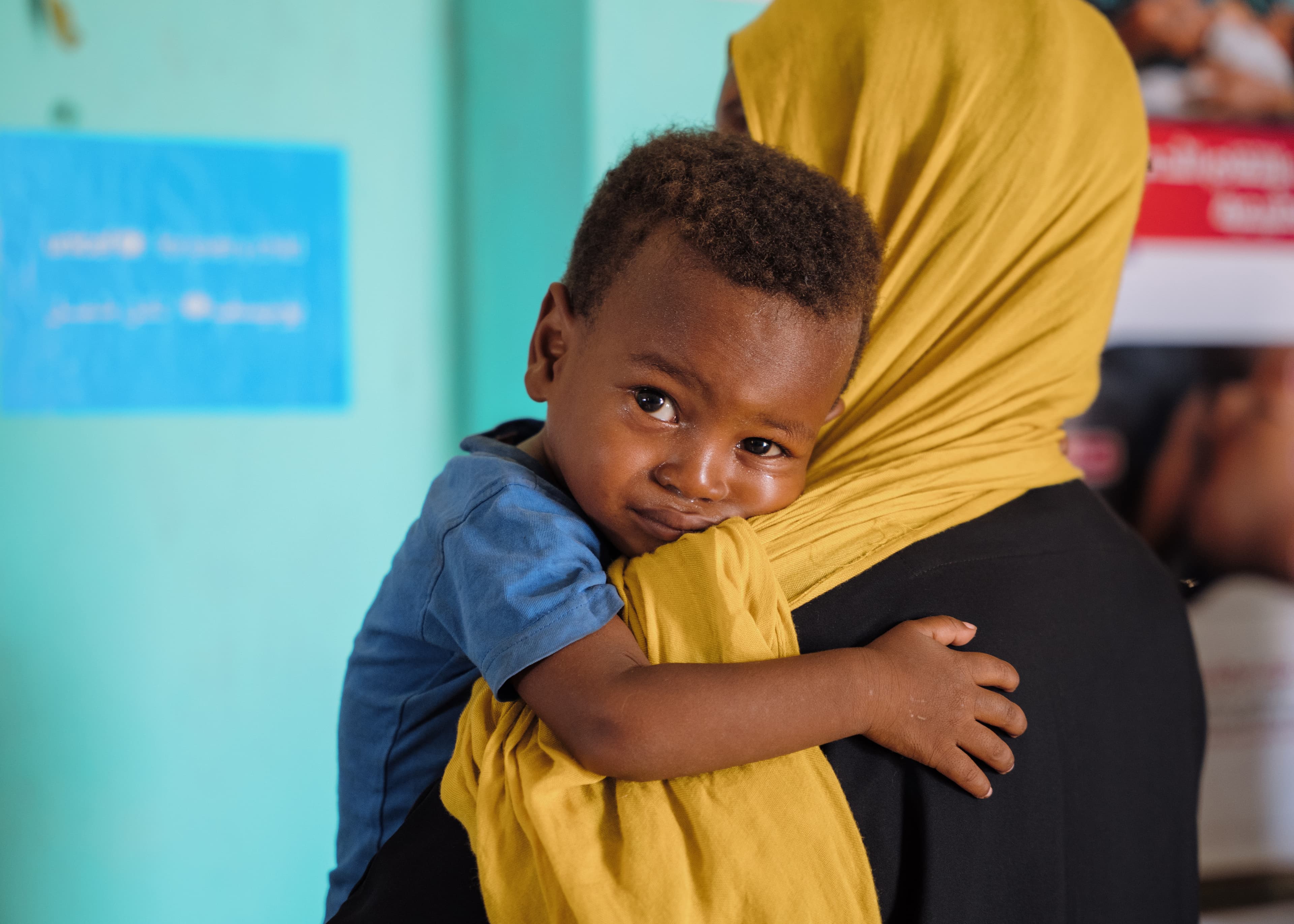 Barn i mammas famn - Sudan 2025 - cropped mobile widget